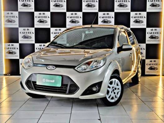 FORD - FIESTA - 2013/2014 - Dourada - R$ 33.900,00